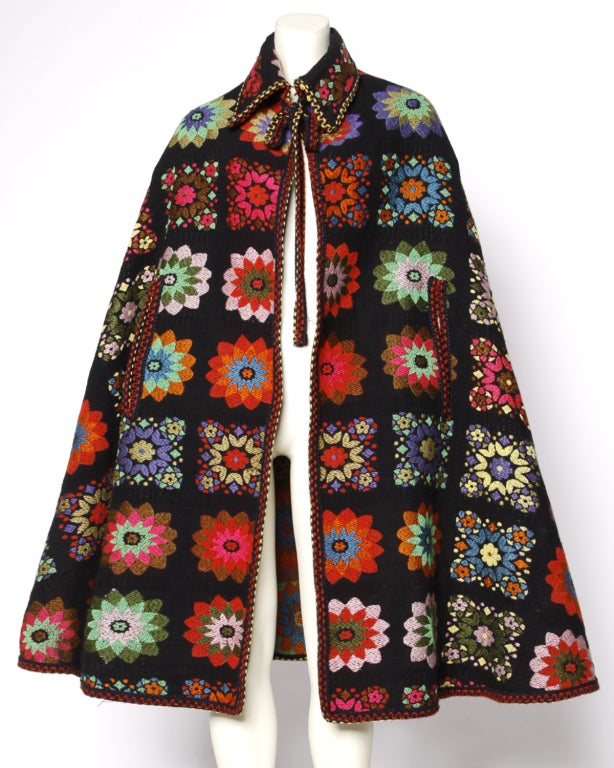 *Free shipping worldwide!

Colorful vintage folk art jacquard cape with a floral design. Unlined. Tie closure at the neck. Arm slits.

DETAILS:

Circa: 1960s
Estimated Size: S-L
Color: Black / Multicolor
Fabric: