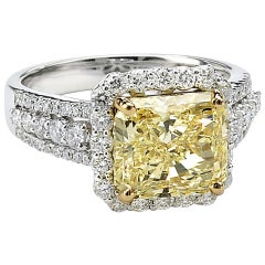 Natural Fancy Yellow Radiant Cut Diamond GIA Certified Ring