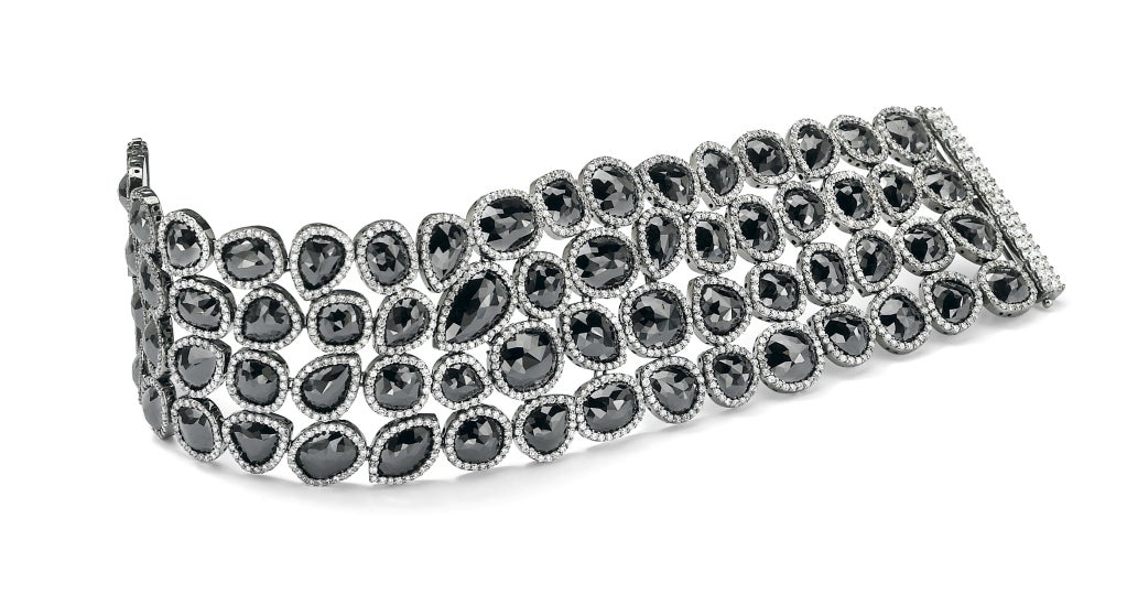 Just over 111ct tw of black and white diamonds make up this magnificent four row bracelet set in 18kt white gold. Multi Shape Diamonds are all surrounded by micro pave with a stunning 
diamond detailed clasp.

David Rosenberg is President of the