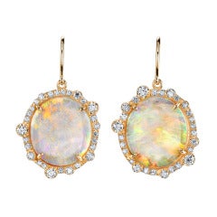 Opal and diamond earrings in rose gold