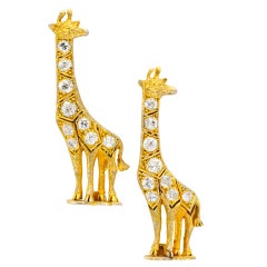 Vintage CARTIER LONDON-A pair of Diamond Giraffe Brooches