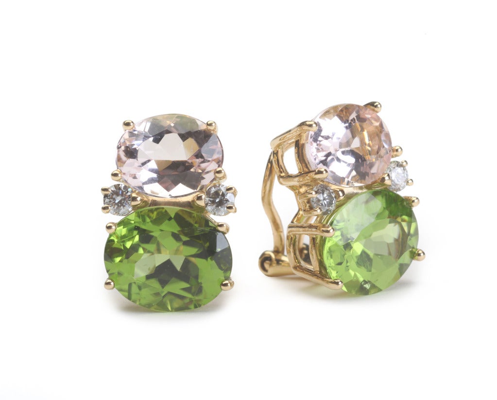 Medium 18kt yellow gold GUM DROP™ earrings with kunzite (approximately 2.5 cts each), peridot (approximately 5 cts each), and 4 diamonds weighing 0.40 cts. 

Specifications: Height: 3/4