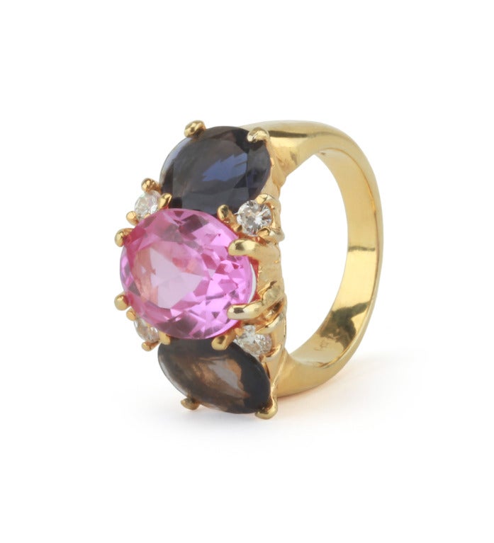 Medium 18kt yellow gold GUM DROP™ ring with Pink Topaz (approximately 5 cts), iolite (approximately 4 cts each), and 4 diamonds weighing 0.48 cts.

Specifications: Length: 7/8