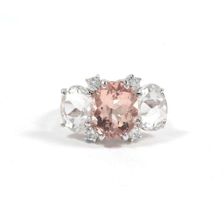 Medium 18kt white gold GUM DROP™ ring with morganite (approximately 5 cts), white topaz (approximately 4 cts each), and 4 diamonds weighing 0.48 cts.

Specifications: Length: 7/8