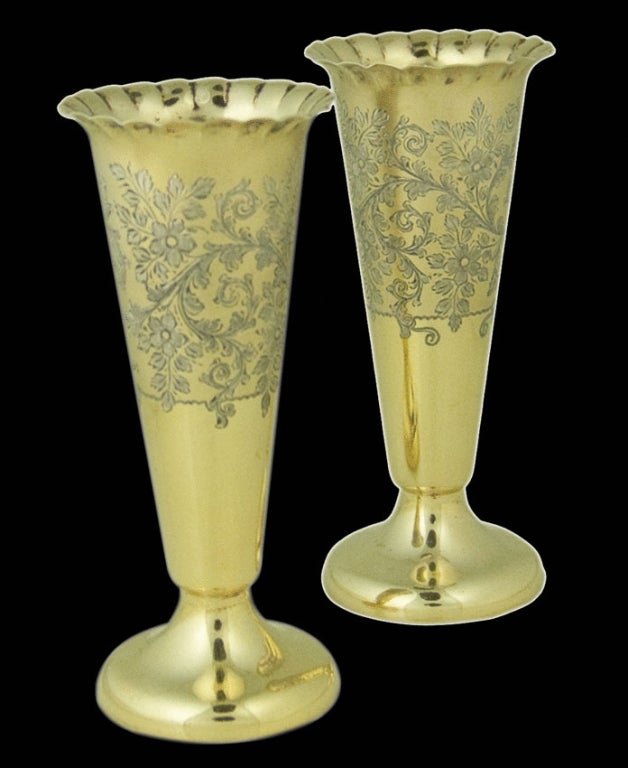 A wonderful quality pair of silver-gilt vases in their original fitted case (not shown), with fine bright-cut decoration.