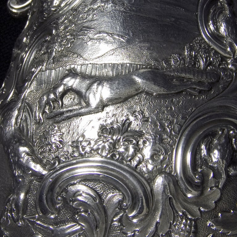 A very interesting William IV silver dome topped tankard. Decorated with original chasing the lid and foot having beautifully worked shell borders. The body being chased in high relief with hunting and shooting scenes depicting animals,birds and