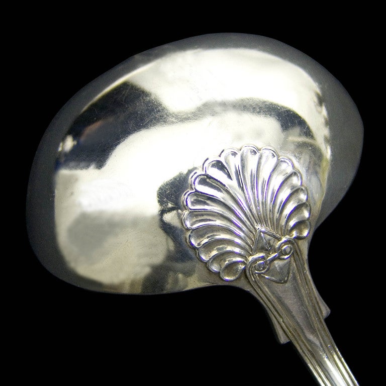 An early Victorian KINGS pattern soup ladle with diamond shell decoration.