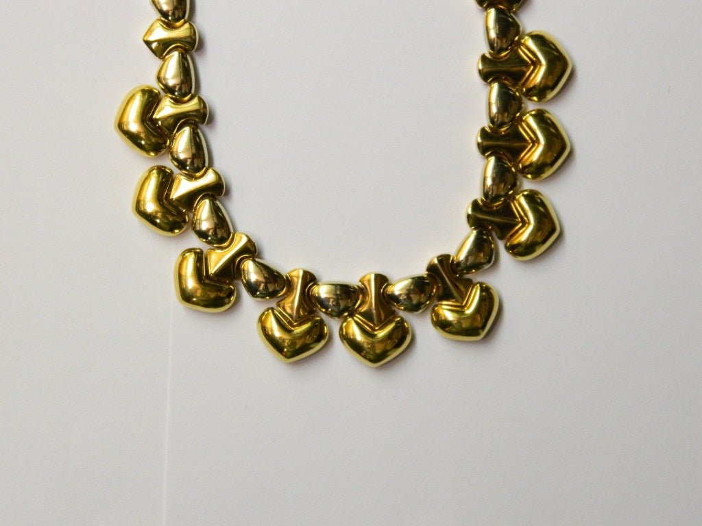 A gold necklace with the house's classic heart shaped decorations, manufactured by Marina B. in the 1960s, mounted in 18kt yellow and white gold