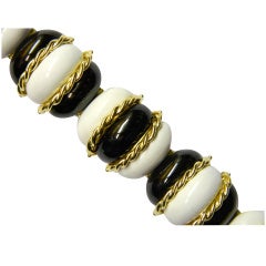 A Sophisticated Black & White Enamelled Gold Bracelet