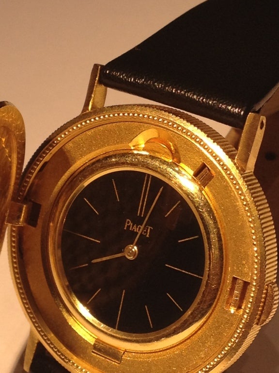 Piaget wristwatch within a twenty dollar gold coin.