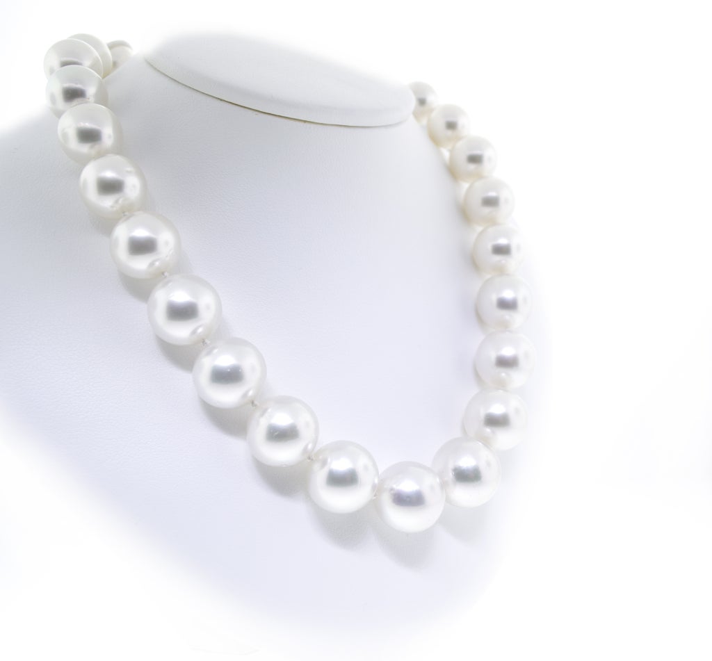 The necklace is composed of high quality 12 to 15mm Tahitian South Sea Pearls.  The 18K White Gold clasp is encased with 2 Carats of Diamonds.