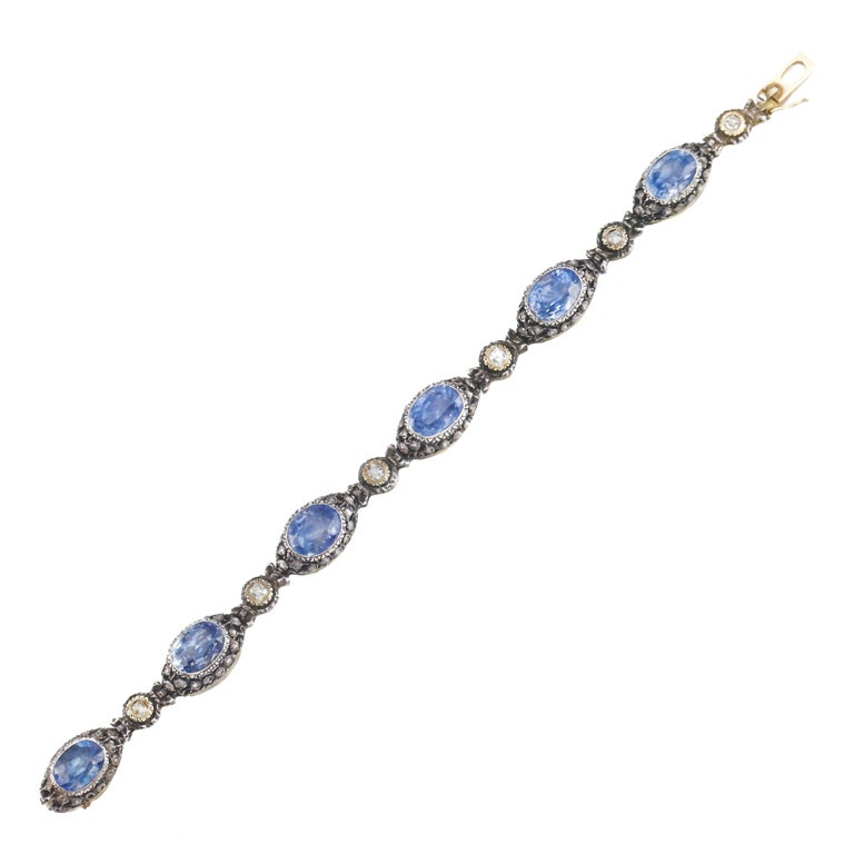 Silver and 18K Gold bracelet with 5 Carats of Diamonds and 20 Carats of unheated Ceylonese Sapphires.  From an Italian Noble Family.  Originally a Tiara from 1830, remade into a bracelet by Buccellati in 1935.

Circa 1930.