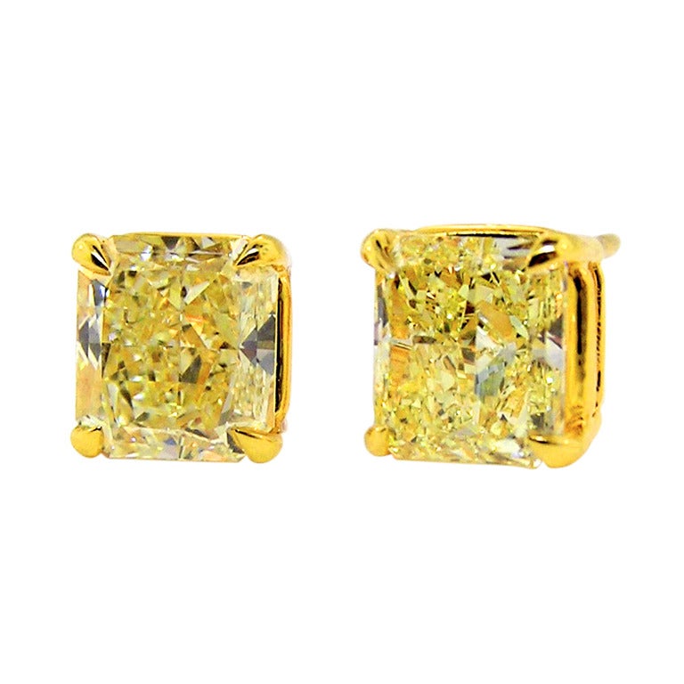 Natural Canary Radiant cut Diamond Earrings, 6.04 Carats Total For Sale