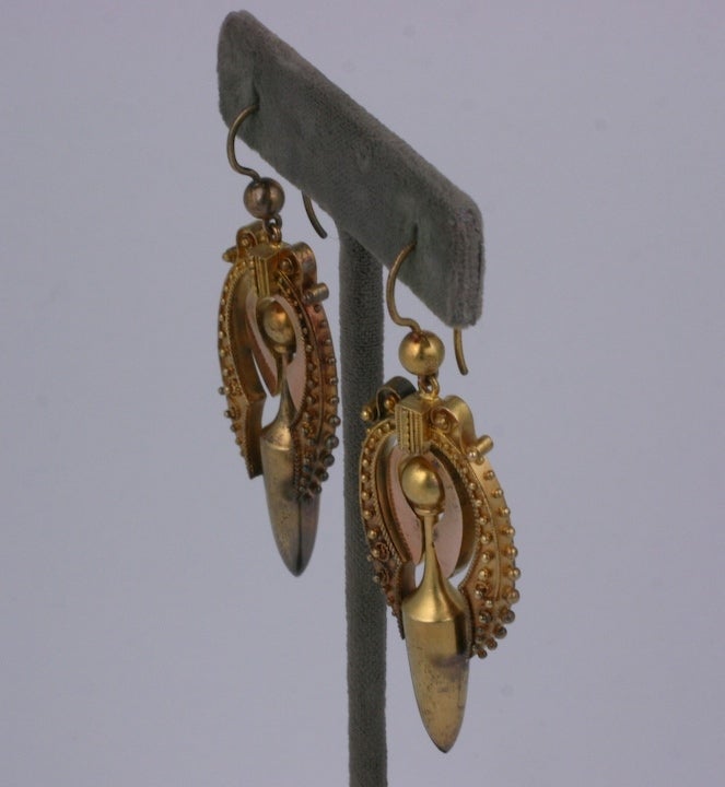 Lovely quality Victorian urn earrings with Etruscan work rendered in 2 tones of gold. In original condition with period ear wires. Beautiful quality circa 1880s USA.
Excellent condition.