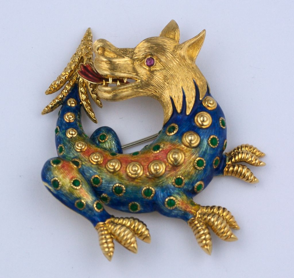 Charming enamelled 18K fantasy dragon brooch with multicolored translucent enamels. Beautifully designed with a small ruby.
2.25
