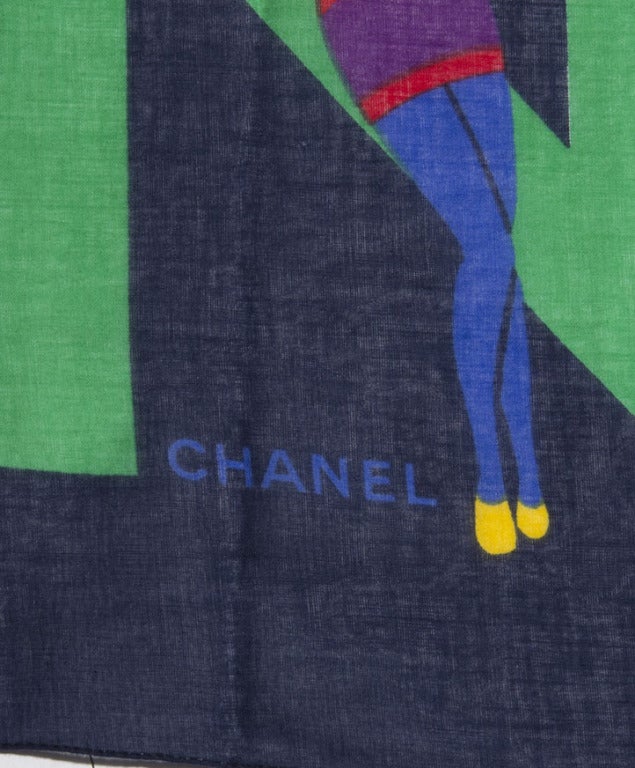 Big Chanel silk scarf in green, navy with Chanel logo and swimmers print.

160 cm x 130 cm
63