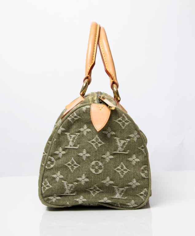 This is a chic and stylish bag from the Louis Vuitton Monogram Denim collection and is very popular among Louis Vuitton lovers everywhere. It features unique stonewashed denim with the iconic LV pattern and two gusseted pockets with push-lock