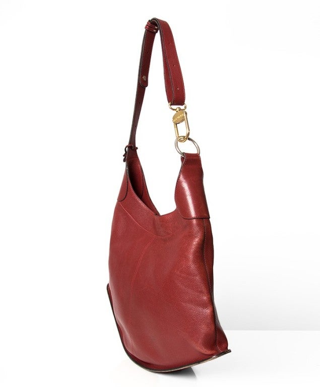 Delvaux Bag in bordeaux grained leather. With gold hardware.