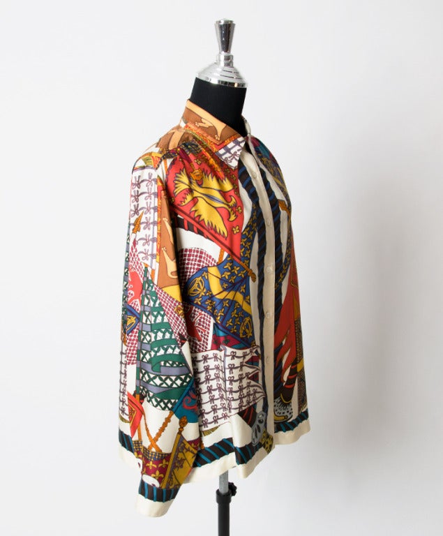 Hermes button-up blouse made from signature printed silk.