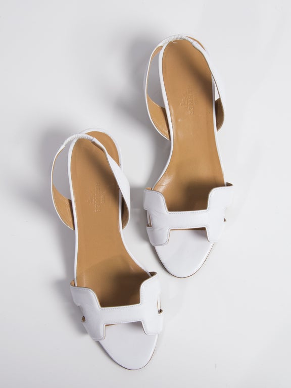 Retro-style white matte leather sandals.