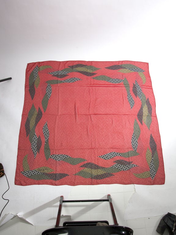 Stunning Christian Dior red dotted silk scarf with green and black/white features.

133 cm x 133 cm
51