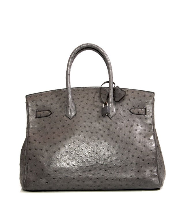 Beautiful famous HERMES BIRKIN in grey ostrich leather size 35. 
The bag comes with clochette and padlock with two keys. The hardware is only very lightly scratched. The bag is in a very good condition with very light wear to the bottom corners and
