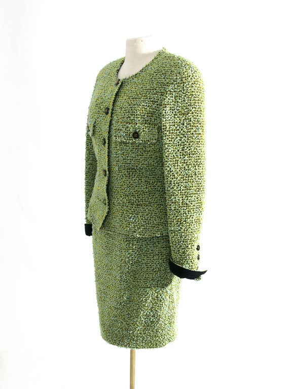 Chanel Wool Vest Col Marin Lime is an iconic vintage piece, a must in your closet! It's from the 90s and made of wool, the linen is silk. The tweed is jade and lime: a very fresh hue, very contemporary feel! 
Comes with extra fabric and buttons.