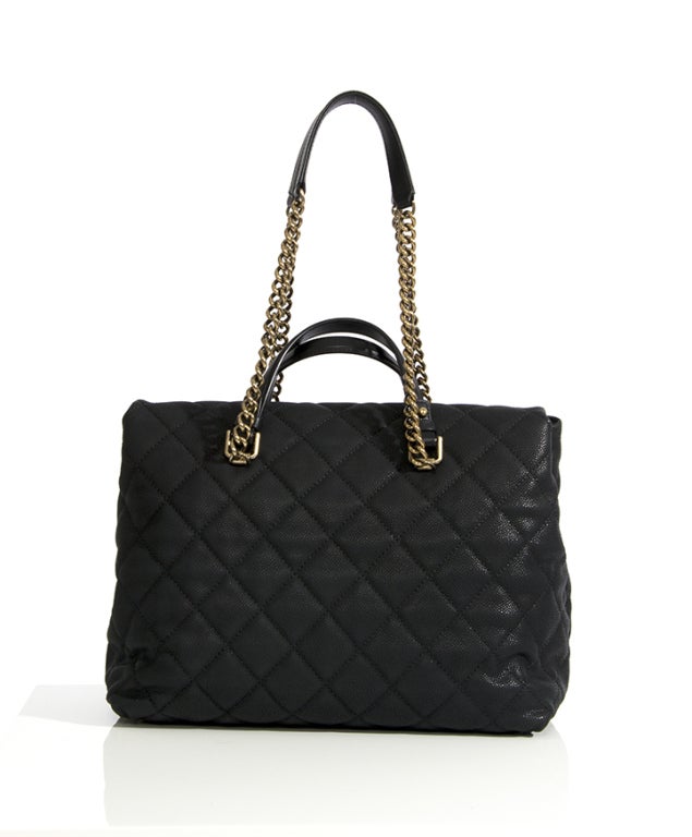 BRAND NEW Chanel Large Tote Collection Spring/Printemps 2013 Black. Made from iridescent grained calfskin with bronze hardware.
Comes in original box and dustbag, with authenticity card N°17438635. 
Final Sale.

8,7