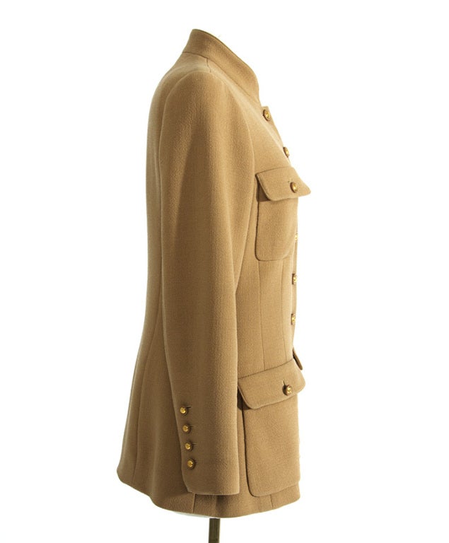 Cream colored Chanel blazer vest featuring rare Mao collar reminiscing vintage 60s blazer cuts. 100 wool. EU size 40.