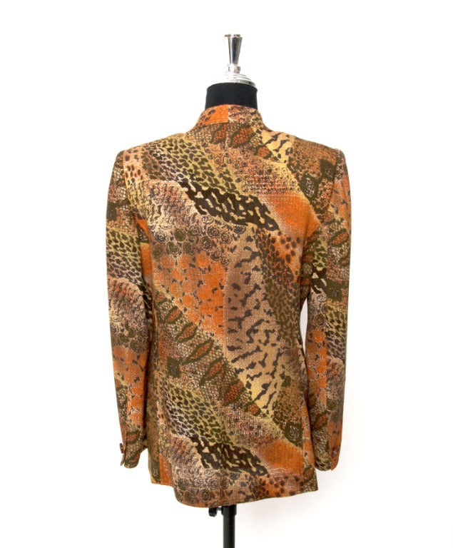 Emanuel Ungaro parallÃ?¨le blazer. Multi-color leopard print, different types of orange and brown.
One button closure and 2 open pockets on the side. 
Definitely a vintage piece that will give your outfit a unique twist. 

Length: 75cm /