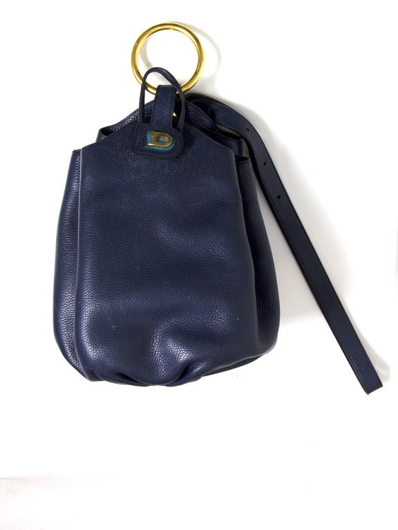 Bought in '91 in Antwerp (Belgium) this authentic vintage Delvaux bag features a lovely peacock blue hue and gold hardware. Essentially a 90s bag it is very much sought after these days by the young and hip! 

W 9