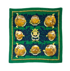 HERMES Green, navy and gold silk scarf "Termes de Vénerie"