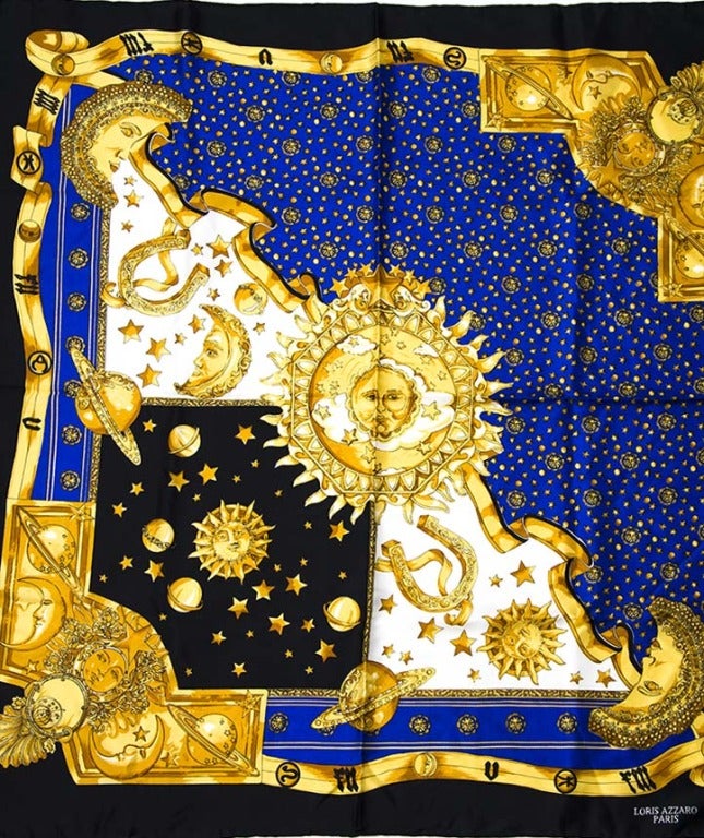 Lovely scarf made form 100% silk in black, midnight blue and god tones.