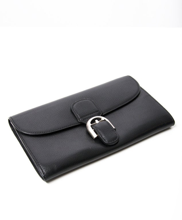 Delvaux Navy Blue Leather Wallet in grained calf hide with brushed steel hardware. 

Features a zipper pouch and card slots.