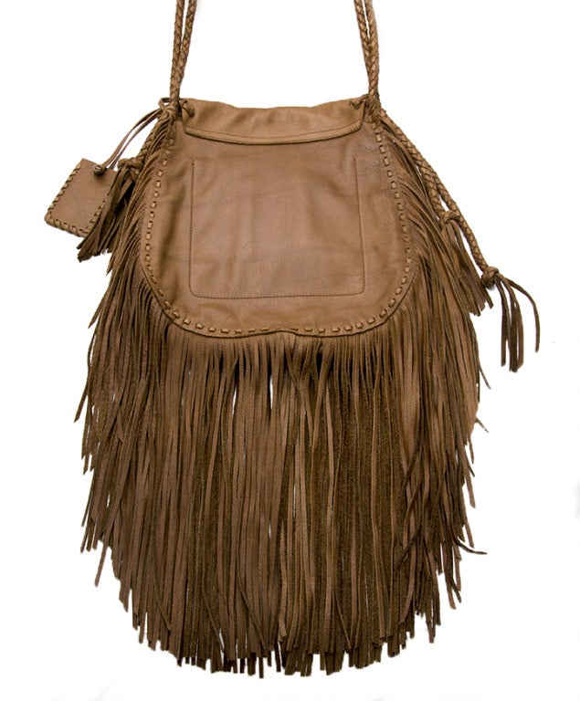 This Ralph Lauren Large Fringe Luggage Bag is made from 100% cow hide, it's super supple and lightweight. 
Comes with authenticity card + hologram. Serial N° 174032

This medium to large shoulder bag is acontemporary style by Ralph Lauren. It was