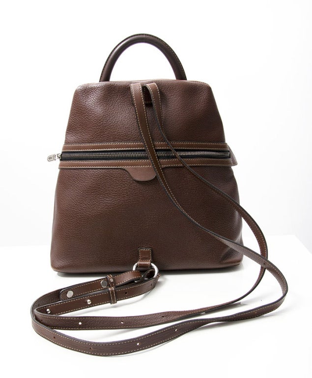 Nutbrown Deux de Delvaux backpack, type 'Fregate'. Has two adjustable shoulder straps and silver hardware throughout. 

13
