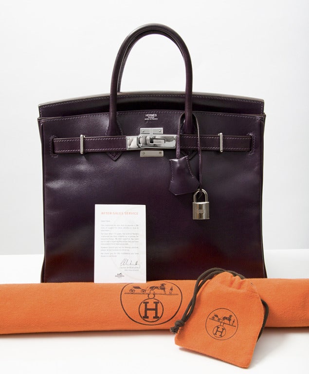 Authentic and rare Haute à Courroies. A real collector's item, the 28cm HAC !!
A type of Hermes Bag which later gained more fame as 'Birkin Bag'. 

The color is 'Raisin'. French for 'grape', referring to red wine rather then the actual color of