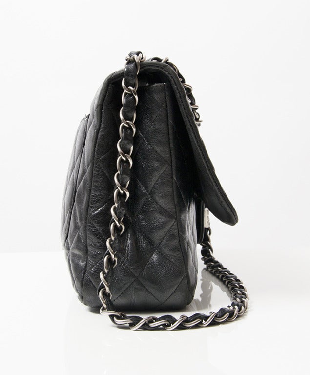 Chanel Reissue 2.55 Mademoiselle Lock Black Elephant Veins Leather Bag. One compartment and one inside zipper pocket. In very good condition! Comes with Original dustbag.