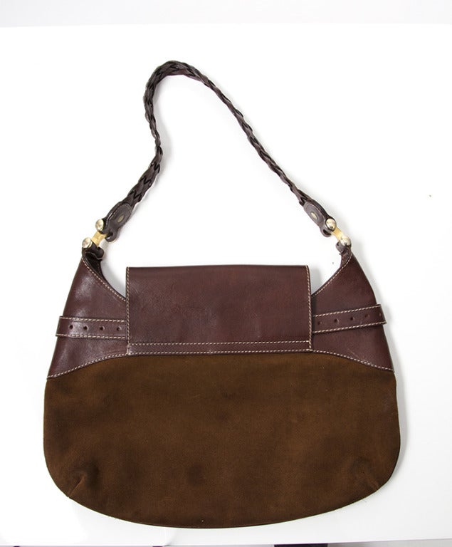 Gucci chocolate brown suede hobo bag. Pale-gold hardware. Internal zip-fastening pocket. Burgundy leather on top with a woven leather strap.