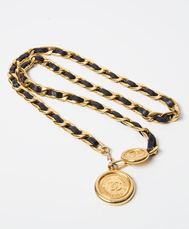 Chanel gold chain belt or necklace with two gold medals. 
Size 85 (or size Small)