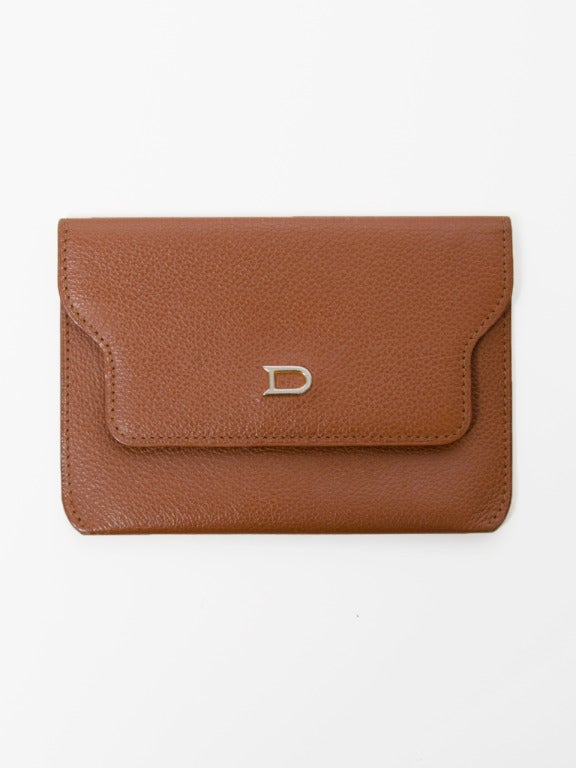 Delvaux cognac wallet and card holder. Seperate compartment for credit cards. In very good condition. Certificates included.