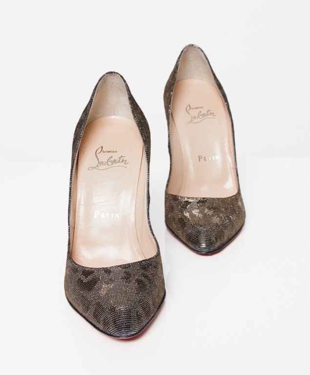 Louboutin Leopard Metal Pumps. The fabric is made out of metal threads with subtle leopard print. 

In excellent condition. Next to new. 

EU36