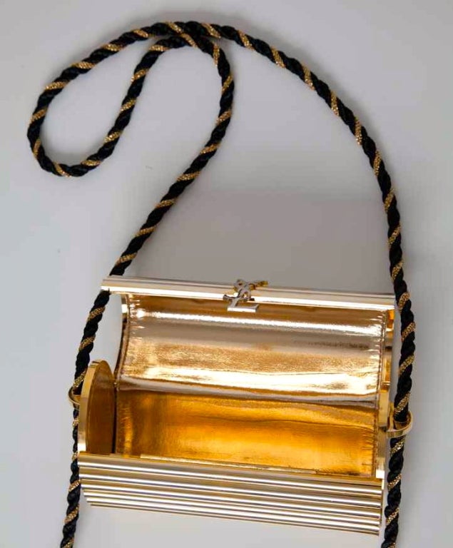 YSL Gold hardware and black tassle clutch/bag at 1stDibs ysl clutch