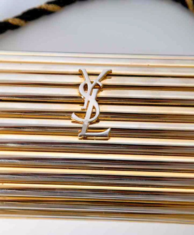 YSL Gold hardware and black tassle clutch/bag at 1stDibs ysl clutch