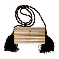 YSL Gold hardware and black tassle clutch/bag