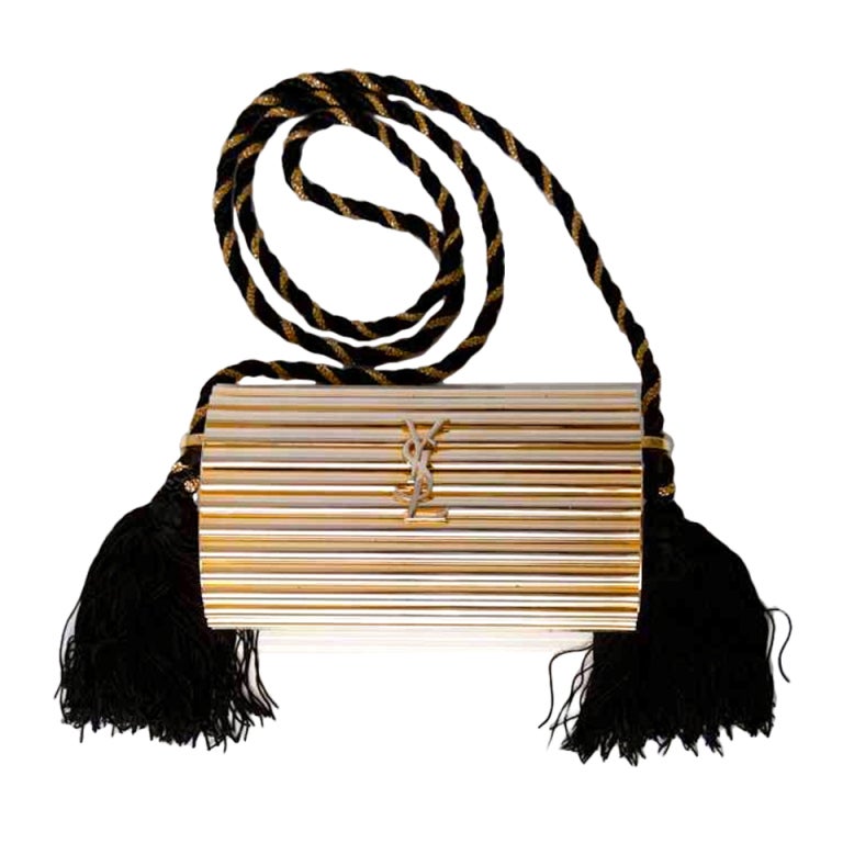 YSL Gold hardware and black tassle clutch/bag at 1stdibs  