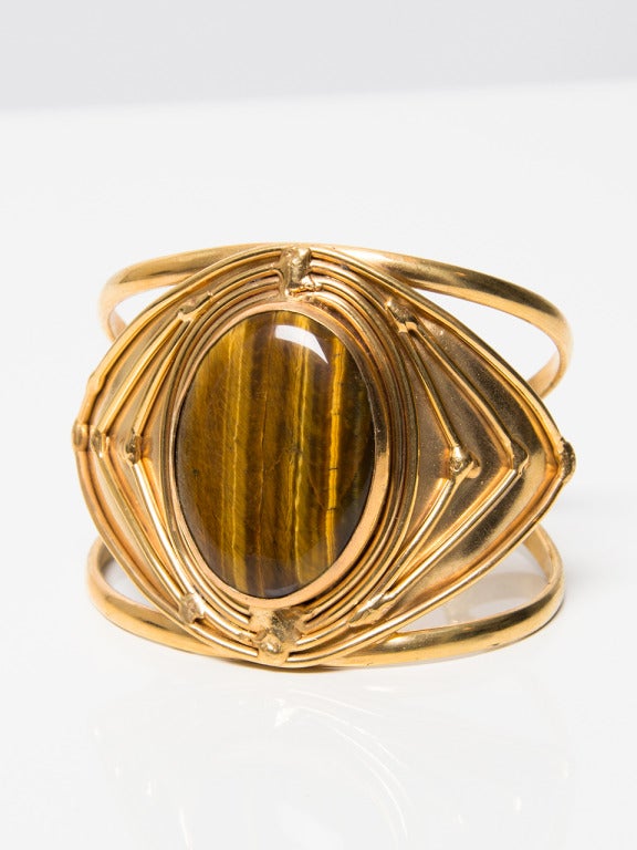 Sylvia Toledano Cuff Bracelet with brown glass bead at the center. 

5,5cm x 9cm