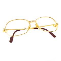 Cartier gold with silver full frame eyeglasses.