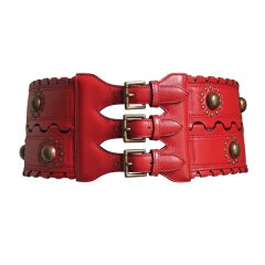 AZZEDINE ALAIA red leather corset belt with brass studs