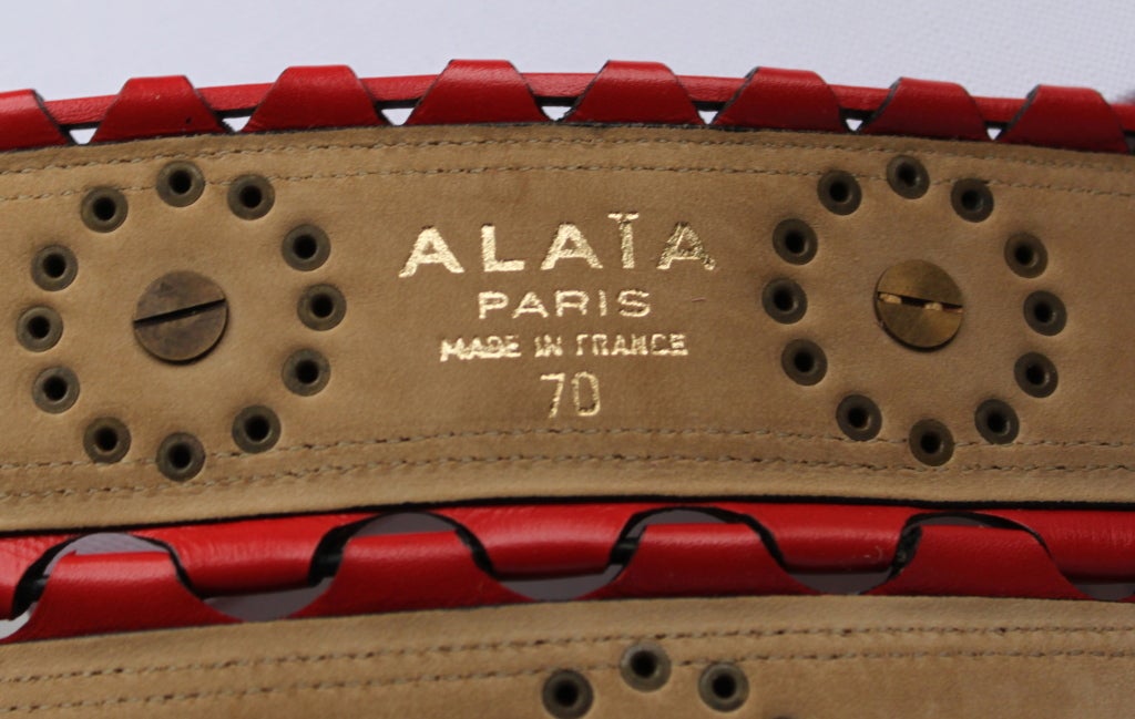 Women's AZZEDINE ALAIA red leather corset belt with brass studs